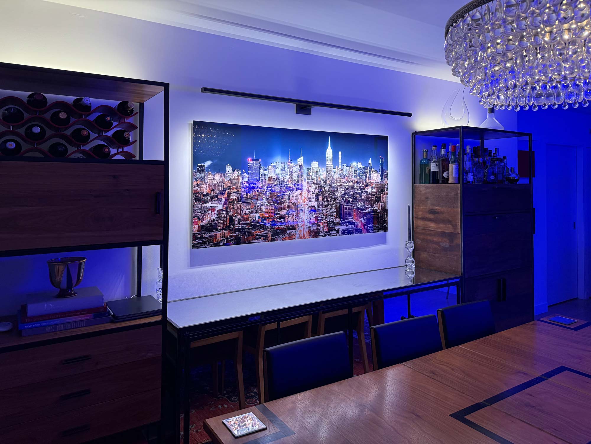 A VAST photo by Dan Piech of the New York skyline hanging in a beautiful dining room.