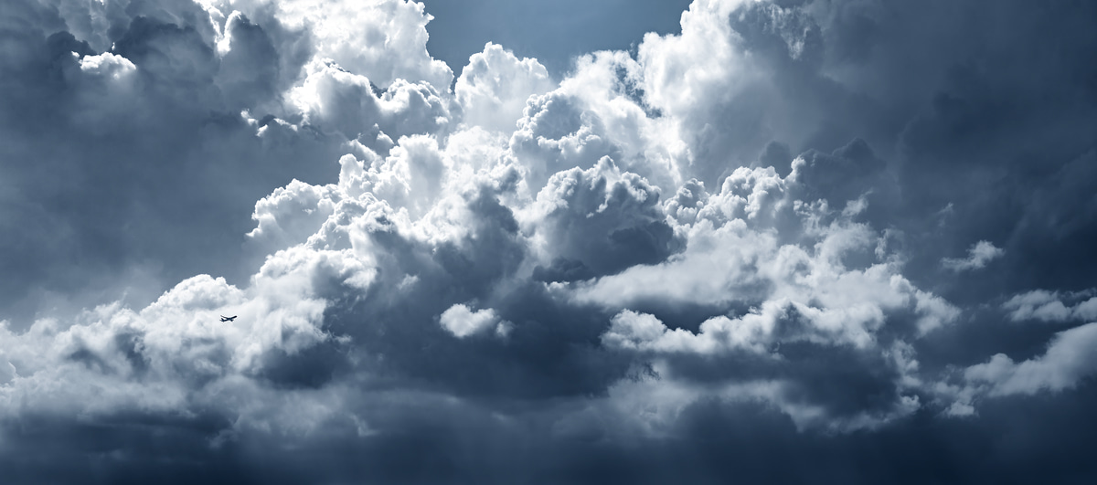 452 megapixels! A very high resolution, large-format VAST photo of an airplane taking off into cumulonimbus clouds forming a thunderstorm; fine art weather photograph created by Dan Piech in New York City.