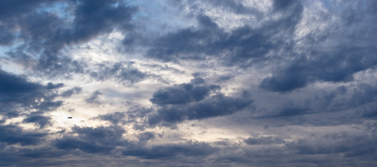 485 megapixels! A very high resolution, large-format VAST photo artwork of an airplane taking off backdropped by a beautiful sunset; fine art airplane photograph created by Dan Piech in New York City.