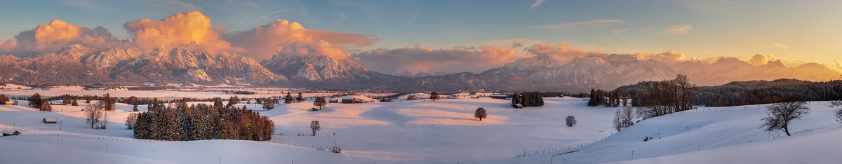 1,719 megapixels! A very high resolution, large-format VAST photo print of a winter landscape with snowy fields and mountains at sunset; wall mural landscape photograph created by Alfred Feil in Füssen, Bavaria, Germany.
