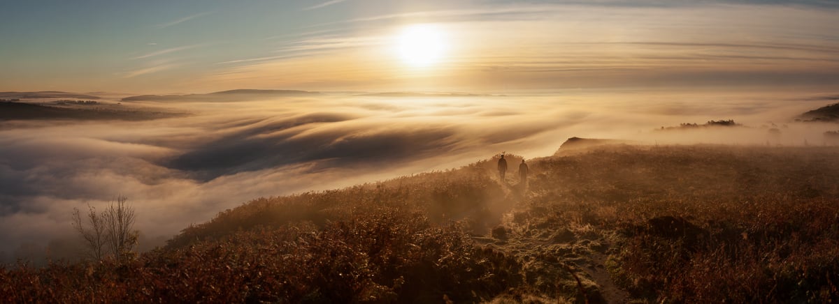 245 megapixels! A very high resolution, large-format VAST photo print of two friends hiking on a hill above the clouds at sunrise; landscape wall art photograph created by Martin Kulhavy on The Cloud trail in Timbersbrook, Cheshire, England.