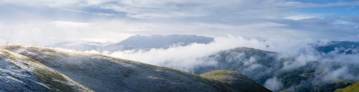 120 megapixels! A very high resolution, large-format VAST photo print of hills covered with a dusting of snow; landscape photograph created by Jeff Lewis in Marin County, California.