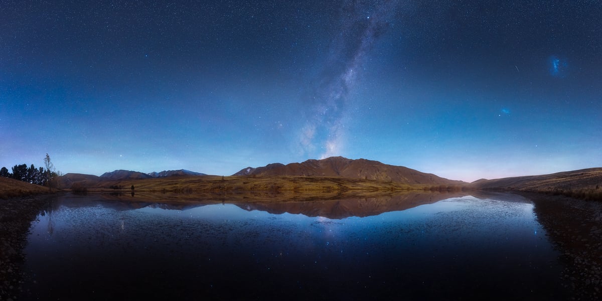 373 megapixels! A very high resolution, large-format VAST photo print of a beautiful lake at night with the Milky Way, stars in the sky, and mountains; landscape photograph created by Paul Wilson in Tekapo, Canterbury, New Zealand.