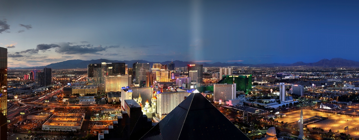 131 megapixels! A very high resolution, large-format VAST photo print of Las Vegas at night with the Luxor pyramid shining its light into the sky; cityscape photograph created by Phil Crawshay in Las Vegas, Nevada.