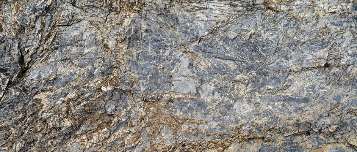 217 megapixels! A very high resolution texture photo of metamorphic rocks with intricate white veining; gigapixel image available to be licensed and downloaded as a digital file from VAST; photograph created by David Lineton.