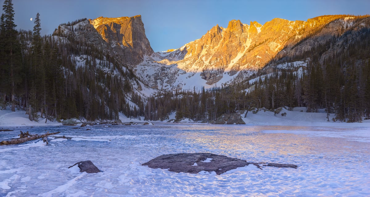 4,635 megapixels! A very high resolution, large-format VAST photo print of a frozen lake in the mountains with a beautiful mountain range in the background at sunrise; landscape photograph created by John Freeman at Dream Lake in Rocky Mountain National Park, Colorado.
