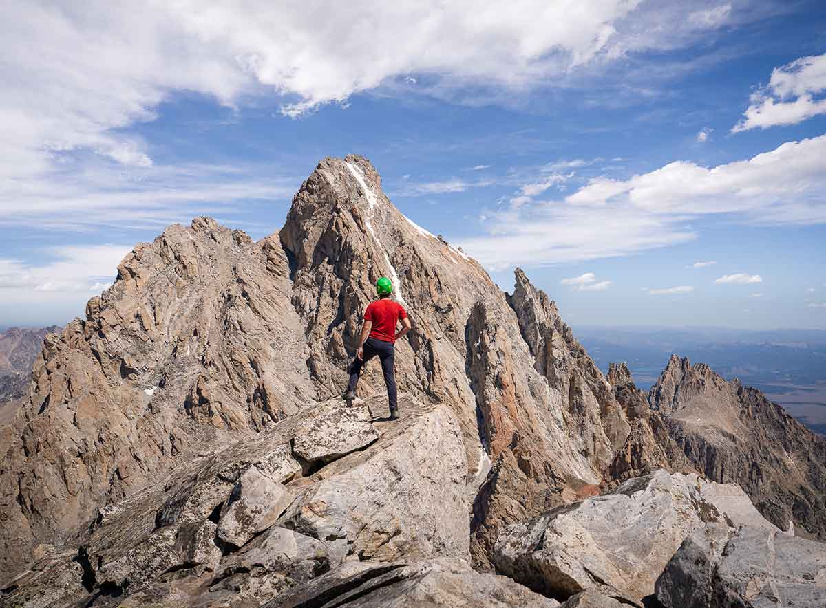 Behing-the-scenes photo of Jeff Lewis hiking the Tetons mountains to create his ultra-high-resolution VAST photos.